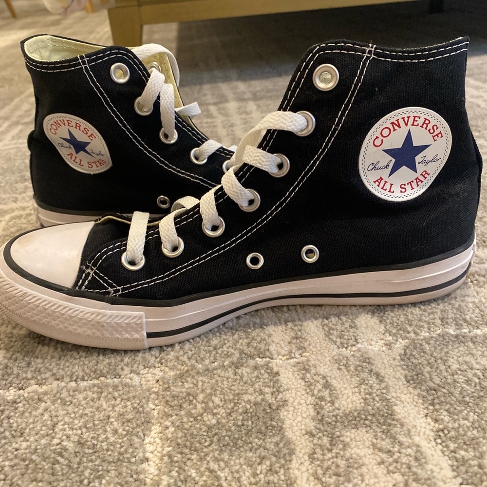 Black high top chuck Taylor converse sneakers